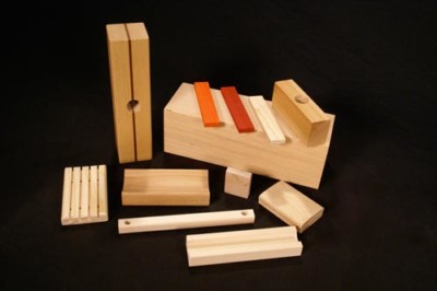 Custom wood mouldings with routing, drilling, and shaping applied for bulk manufacturing.