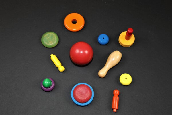 Custom Painted Wood Turnings for Bulk Manufacturing and CPSIA-Compliant Applications Assorted custom-painted wooden turnings in bright colors made for bulk orders and safety-compliant uses.