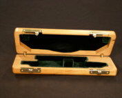 Custom wooden presentation box with hinged lid and felt lining made for bulk or specialty applications.