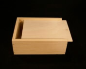 Custom wooden slide top box made from pine and Baltic birch for gift or product packaging.