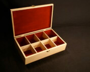 Custom wooden tea box with dividers and precision-crafted compartments.