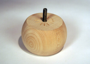 Custom turned wooden bun foot with pre-installed hanger bolt for furniture applications.