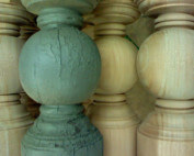 Custom reproduction of exterior wood balusters and columns for architectural restoration.
