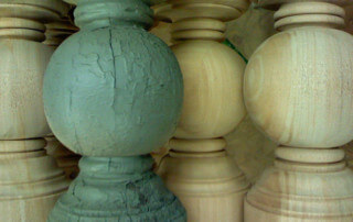 Custom reproduction of exterior wood balusters and columns for architectural restoration.