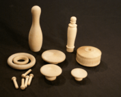 Assorted unfinished wood turnings made for high-volume production and specialty woodworking applications.