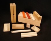 Custom wood mouldings with routing, drilling, and shaping applied for bulk manufacturing.