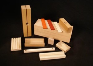 Custom wood mouldings with routing, drilling, and shaping applied for bulk manufacturing.