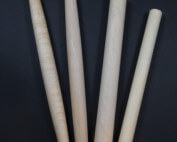 Four tapered French-style wooden rolling pins made from maple and other hardwoods.