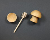 Assorted custom wooden kitchen accessories including dippers, condiment cups, and turned handles.