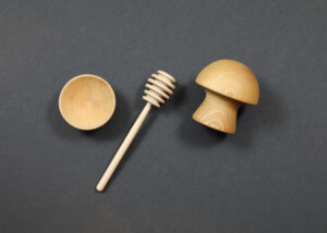 Assorted custom wooden kitchen accessories including dippers, condiment cups, and turned handles.