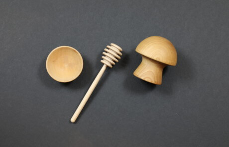 Assorted custom wooden kitchen accessories including dippers, condiment cups, and turned handles.