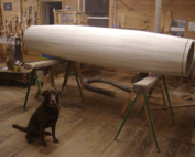 Multiple turned wood columns in various diameters and heights for architectural use.