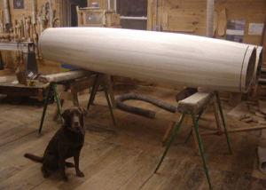 Multiple turned wood columns in various diameters and heights for architectural use.