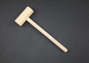 Three custom wooden mallets in different sizes made for various applications such as woodworking, leatherwork, and crab cracking.