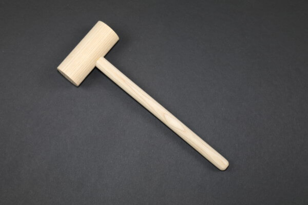 Three custom wooden mallets in different sizes made for various applications such as woodworking, leatherwork, and crab cracking.