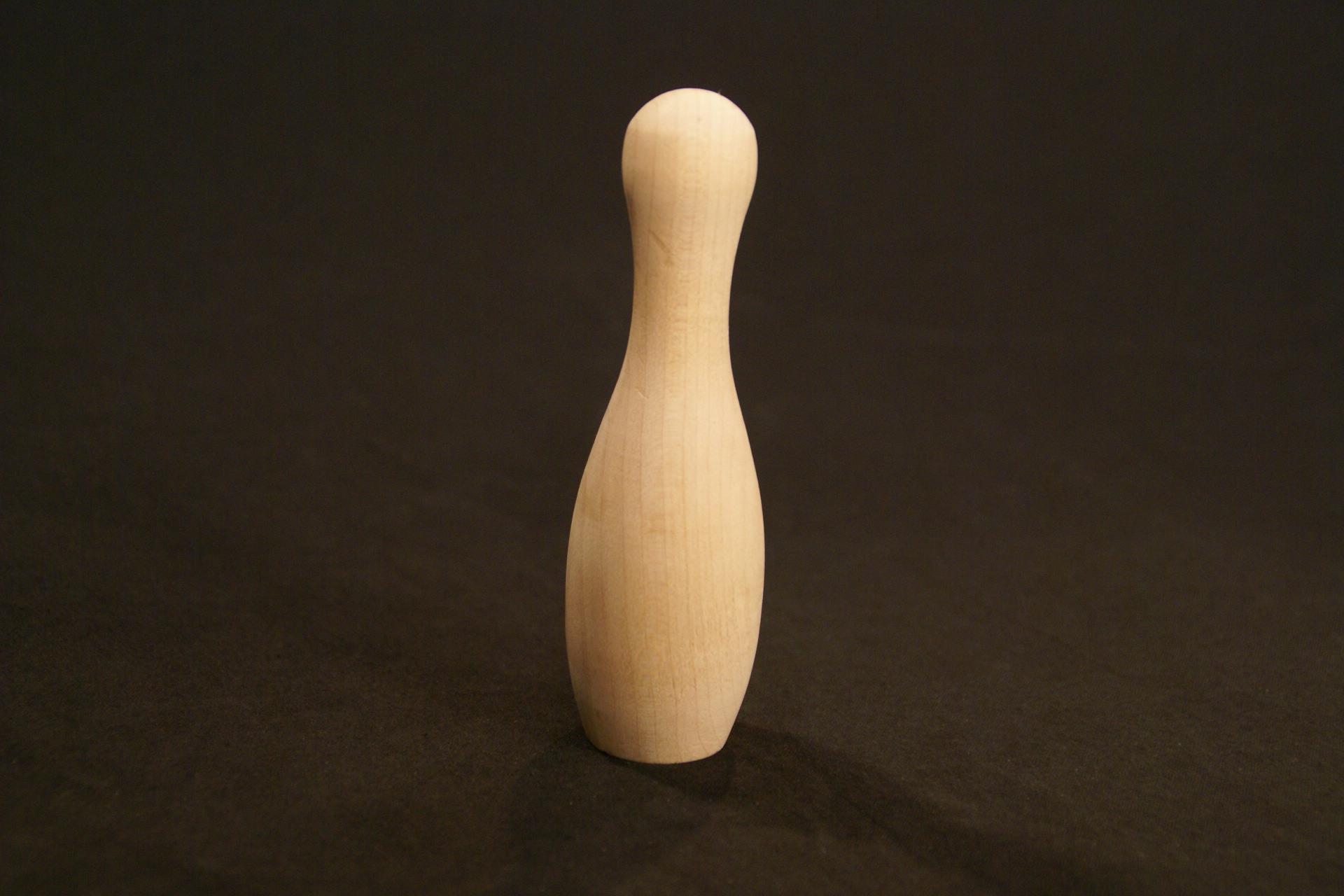 one mini bowling pin