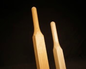 Pair of custom wood wheelbarrow handles made from durable hardwoods like ash and hickory.
