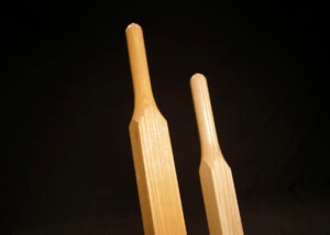Pair of custom wood wheelbarrow handles made from durable hardwoods like ash and hickory.