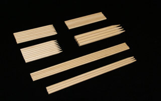 White birch wood skewers arranged in a bundle, produced in various lengths and diameters.