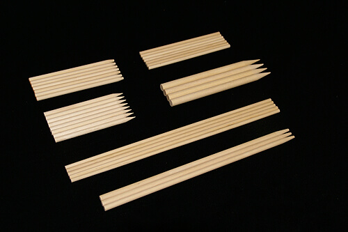 White Birch Wood Skewers for Bulk Manufacturing and Custom Food Applications White birch wood skewers arranged in a bundle, produced in various lengths and diameters.