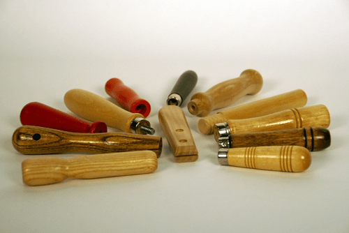 Group of small wooden handles with secondary operations and different finishes