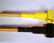 Two custom wooden handles with plastic end caps for utility tools and mops.