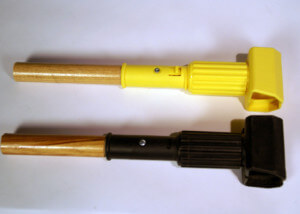 Two custom wooden handles with plastic end caps for utility tools and mops.