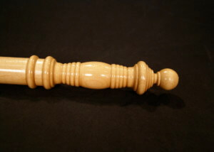 Polished decorative wooden police baton with turned details for commemorative or bulk use.