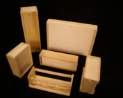 Custom wood beverage carrier and sliding lid boxes made for bulk packaging and display.