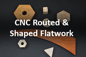 CNC routed and shaped wood panels stacked for manufacturing and production use.