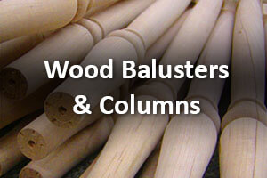 Assorted turned wood balusters and columns designed for staircases, porches, and architectural millwork.