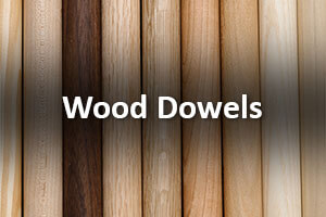 Stack of custom wooden dowels shown with smooth finishes and precision machining.