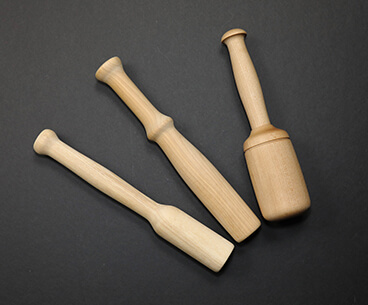 Wooden muddler (3 count) in various shapes and sizes.