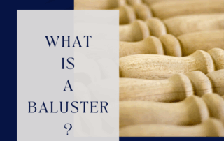 Close-up of turned wooden balusters with text overlay reading “What Is a Baluster?” for H.A. Stiles educational guide.