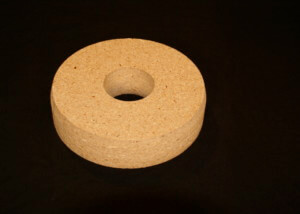 Routed wooden core plugs in varying sizes, made to order for industrial and manufacturing use.