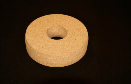 Routed wooden core plugs in varying sizes, made to order for industrial and manufacturing use.