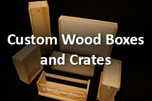 Stacked custom wood boxes and crates with slide lids, designed for bulk manufacturing and specialized orders.