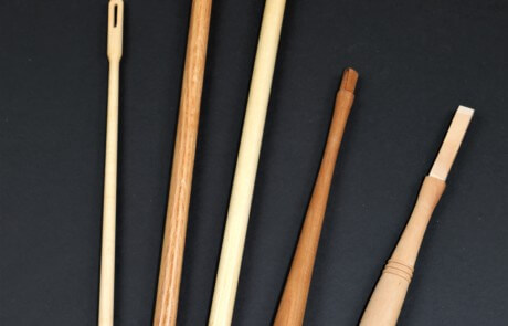 Assorted custom wood handles crafted from various domestic hardwood species.