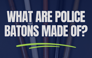 Five wood police batons in different finishes with corded grips, arranged on a dark blue background